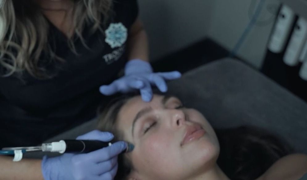 Crown Point HydraFacial patient model receiving treatment